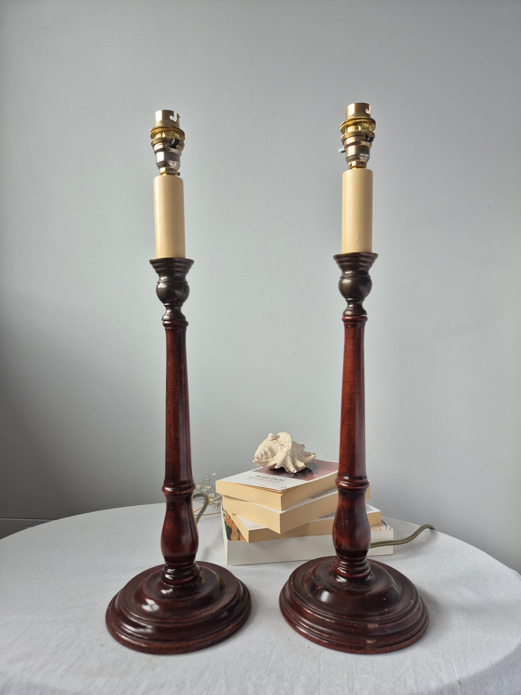 Refined pair of vintage hand-turned mahogany candlestick table lamps